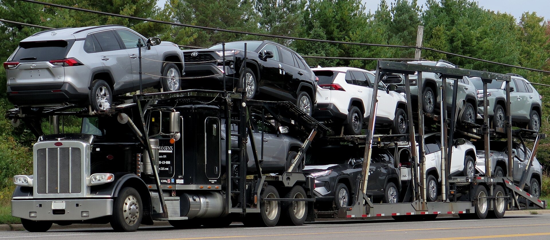 Car carrier transporting multiple vehicles